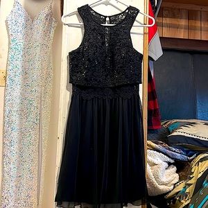 This is a black sparkling dress for woman size 4 worn 1 time